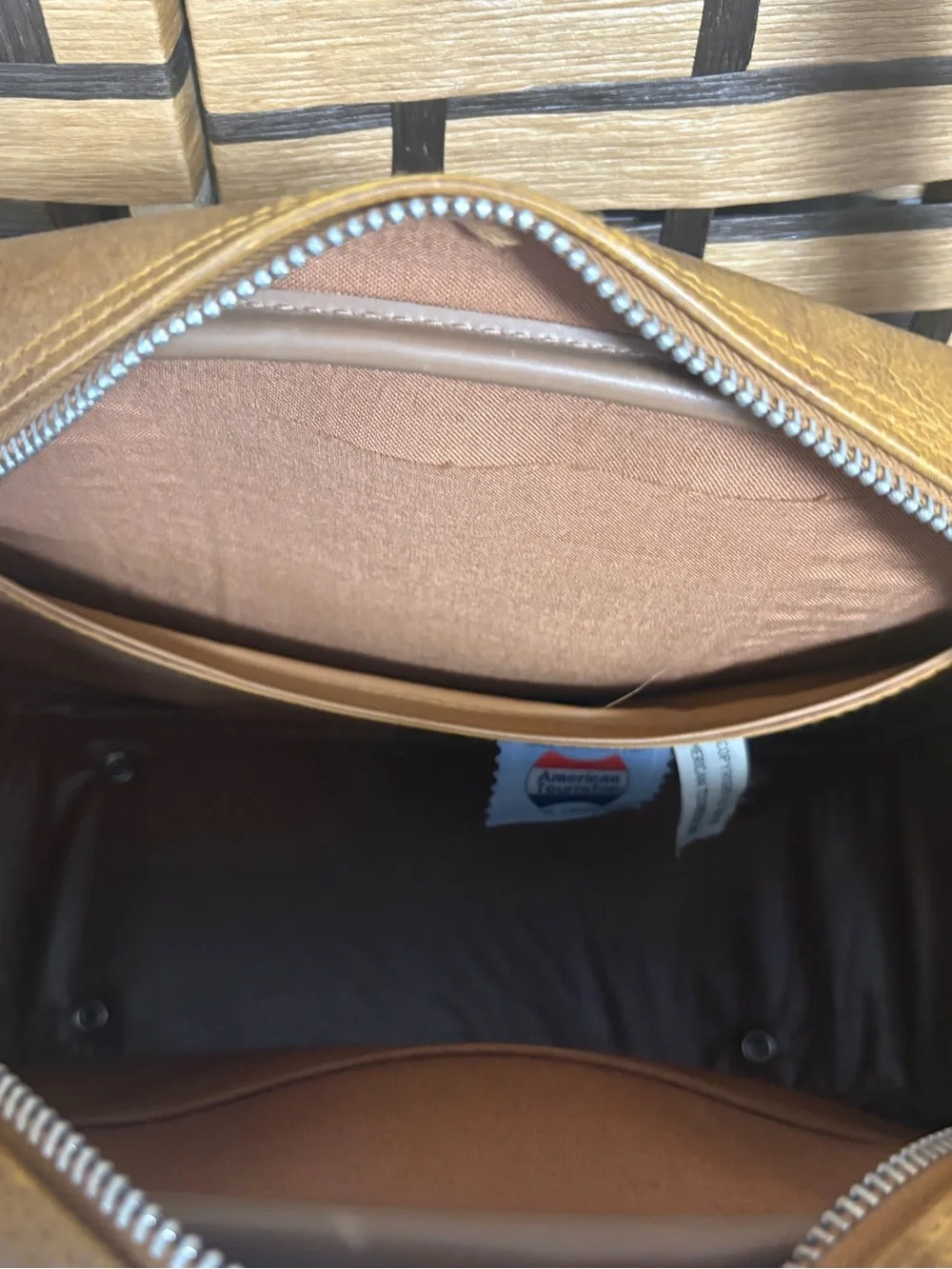 American tourister brown carry on bag